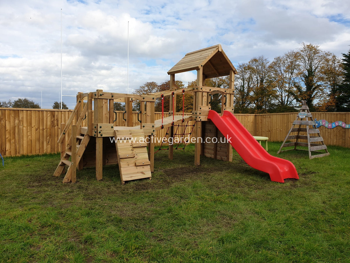 Croft Towers with slide, ladder, climbing walls, net, left-right climber and bridge. INSTALLED