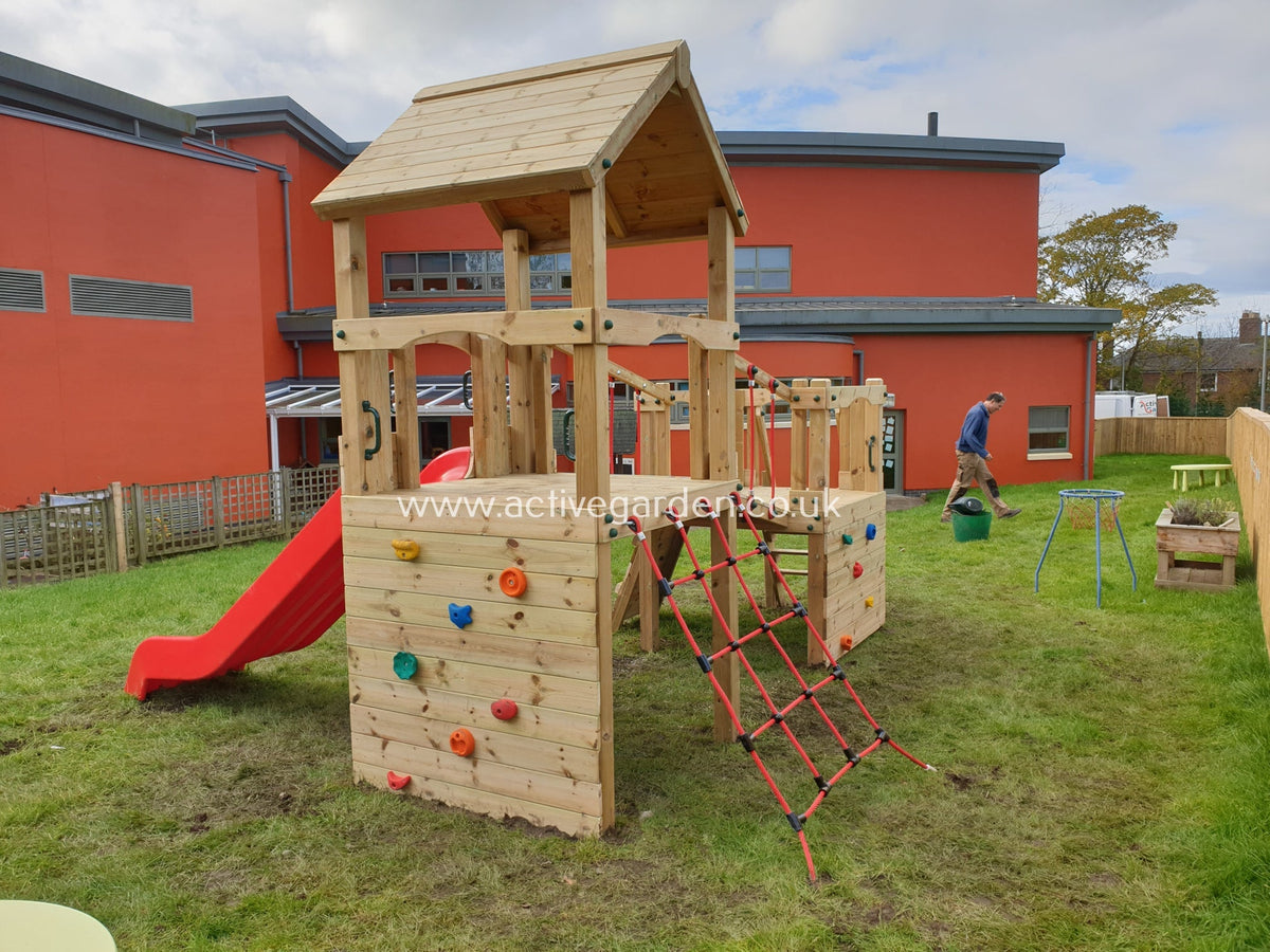 Croft Towers with slide, ladder, climbing walls, net, left-right climber and bridge. INSTALLED