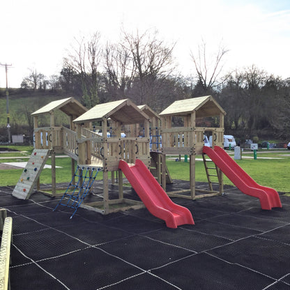 Ludlow Commercial Climbing frame with towers, slides, climbing wall, climber, fireman’s pole and bridges. With installation