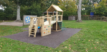 Croft Towers with slide, ladder, climbing walls, net, left-right climber and bridge. INSTALLED