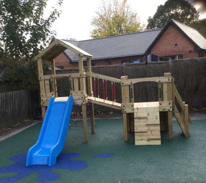 Croft Towers with slide, ladder, climbing walls, net, left-right climber and bridge. INSTALLED