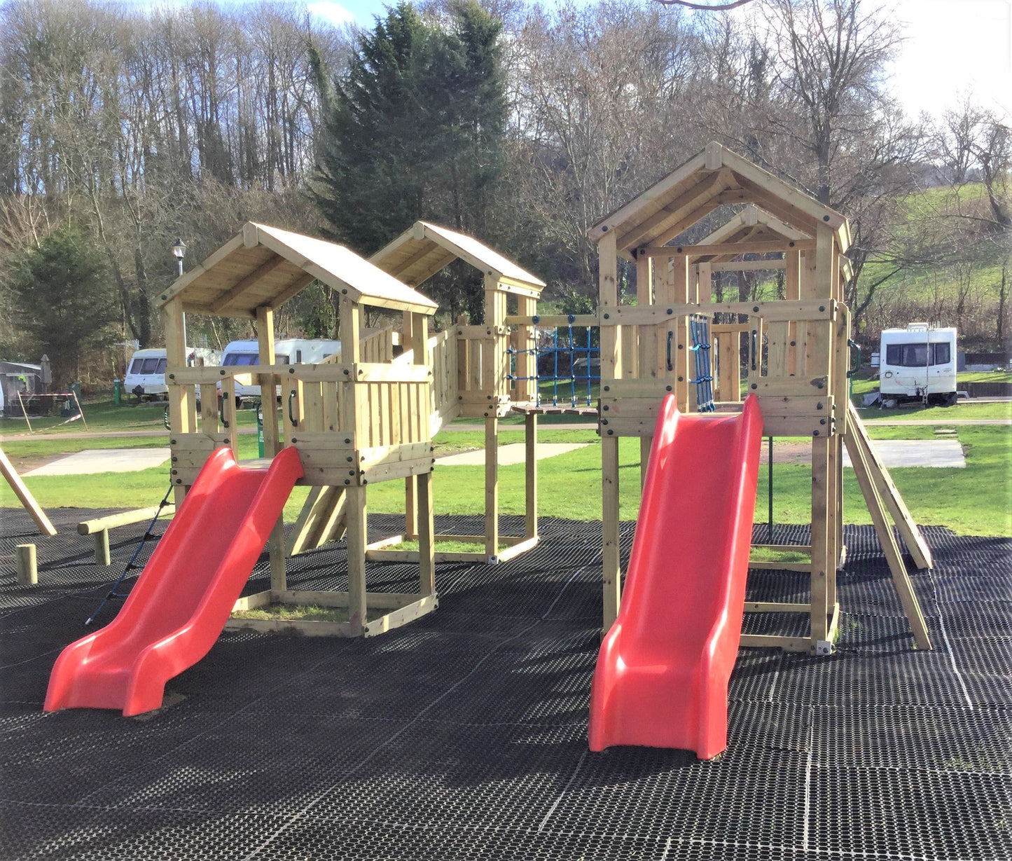 Ludlow Commercial Climbing frame with towers, slides, climbing wall, climber, fireman’s pole and bridges. With installation