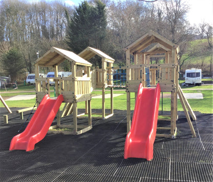 Ludlow Commercial Climbing frame with towers, slides, climbing wall, climber, fireman’s pole and bridges. With installation