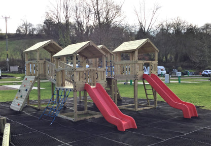 Ludlow Commercial Climbing frame with towers, slides, climbing wall, climber, fireman’s pole and bridges. With installation