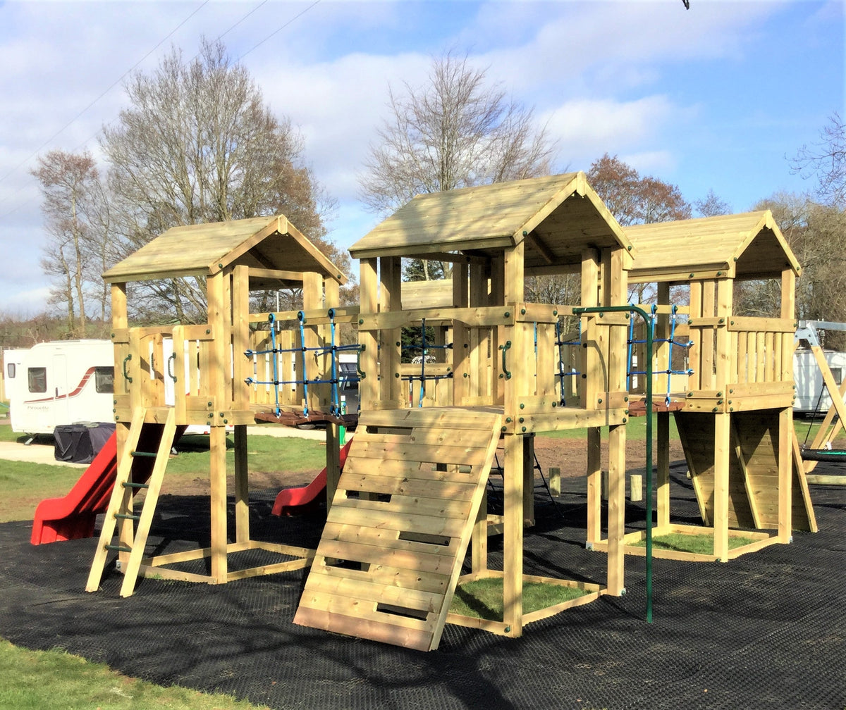 Ludlow Commercial Climbing frame with towers, slides, climbing wall, climber, fireman’s pole and bridges. With installation