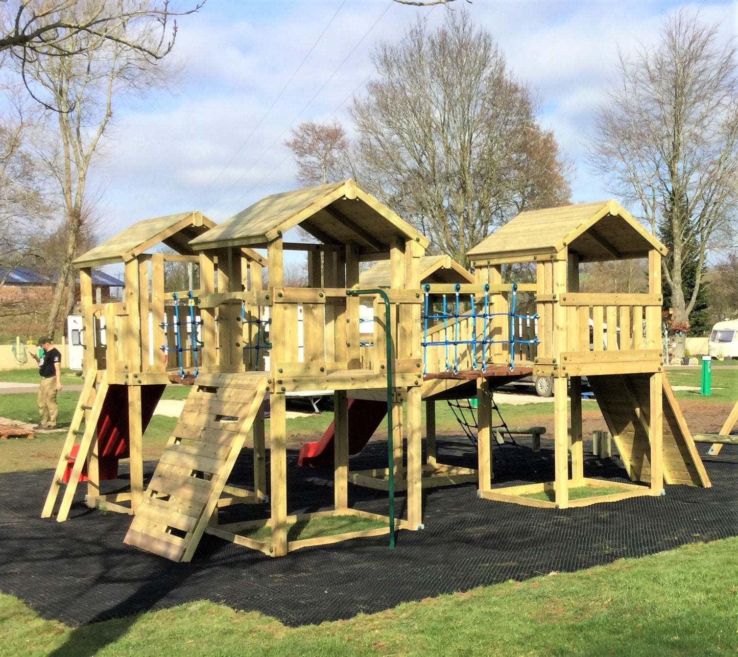 Ludlow Commercial Climbing frame with towers, slides, climbing wall, climber, fireman’s pole and bridges. With installation