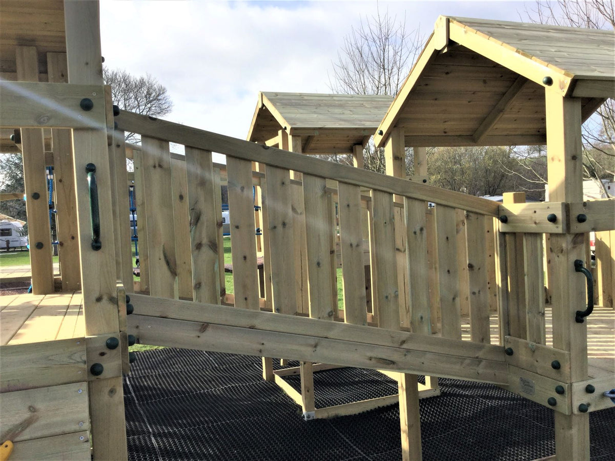 Ludlow Commercial Climbing frame with towers, slides, climbing wall, climber, fireman’s pole and bridges. With installation
